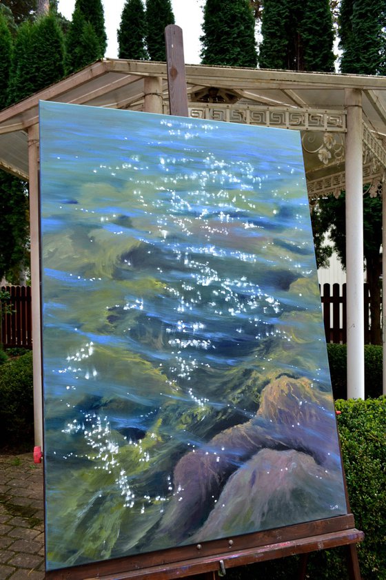 Music of the sea. Transparent water. Large