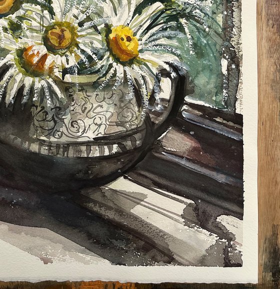 flowers on the window sill