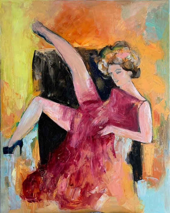 Woman sitting on the armchair