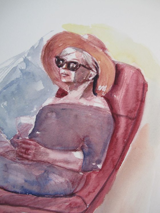 seated woman reading