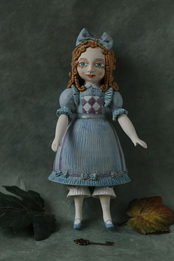 From the Alice in Wonderland. Alice as a little girl.  Wall sculpture by Elya Yalonetski