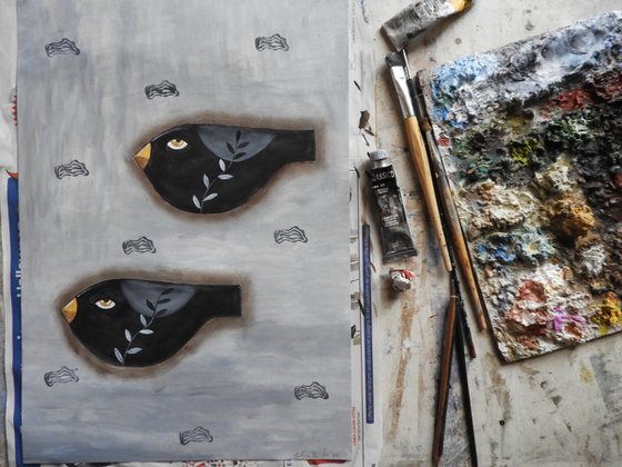 A couple of freaky black birds