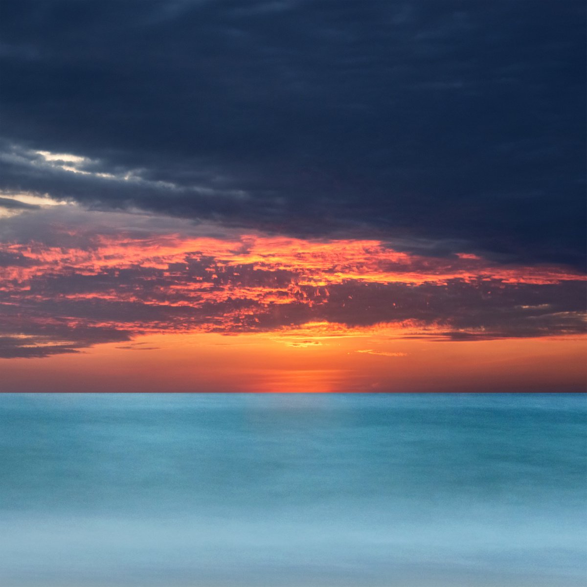 Ocean Sunset by Jacek Falmur