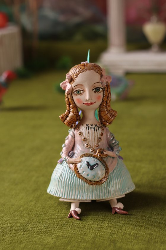 Little Girl with a clock. Hanging sculpture, bell doll by Elya Yalonetski