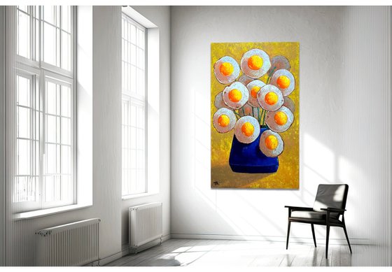 Egg flowers in blue vase