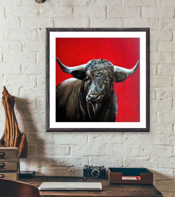 Brave bull on red