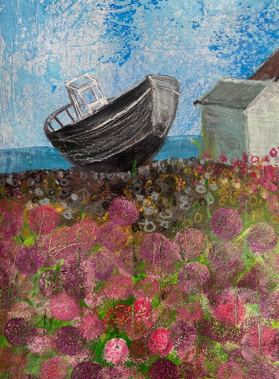 Sea thrift beach huts boat