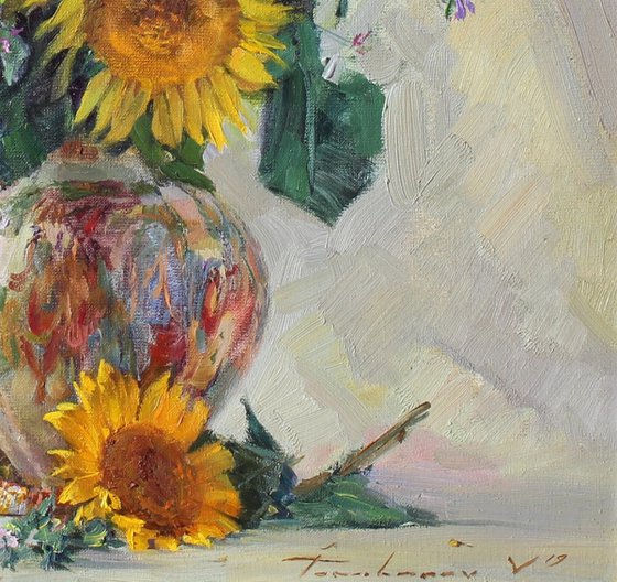 Sunflowers in an antique vase