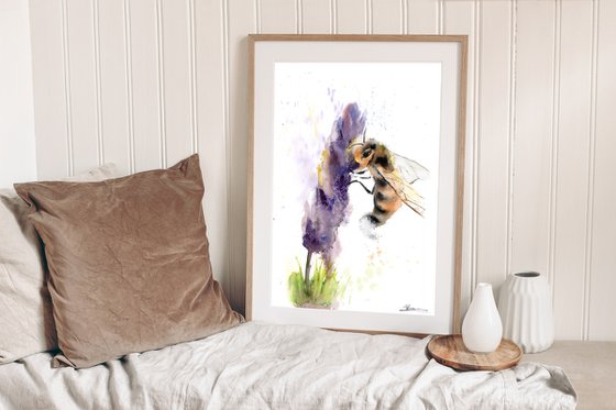 Honey bee and purple flower