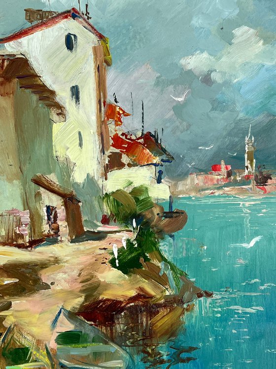Two Boats at a Coastal House