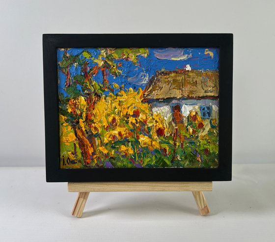 House and Sunflowers