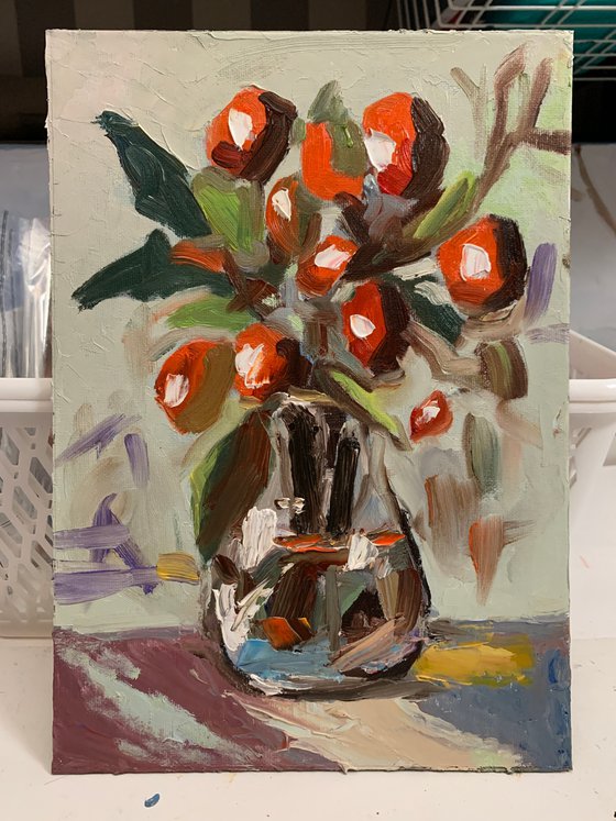 Olive branch in vase.