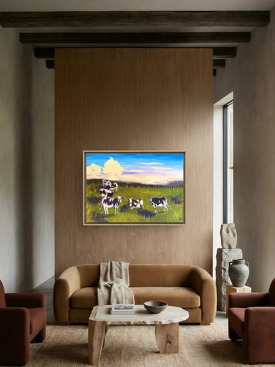 Cows grazing in the field