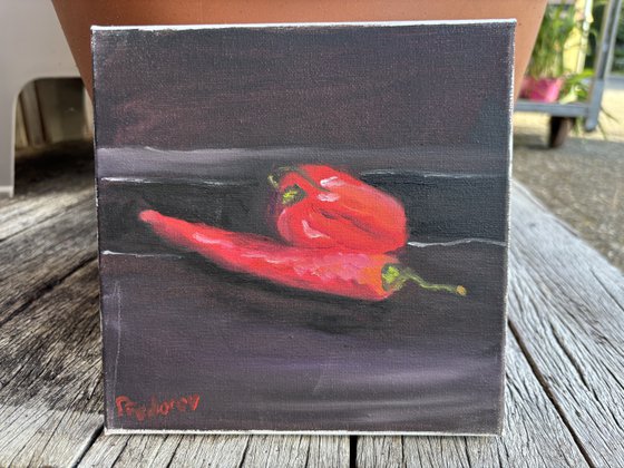 Still life with red peppers