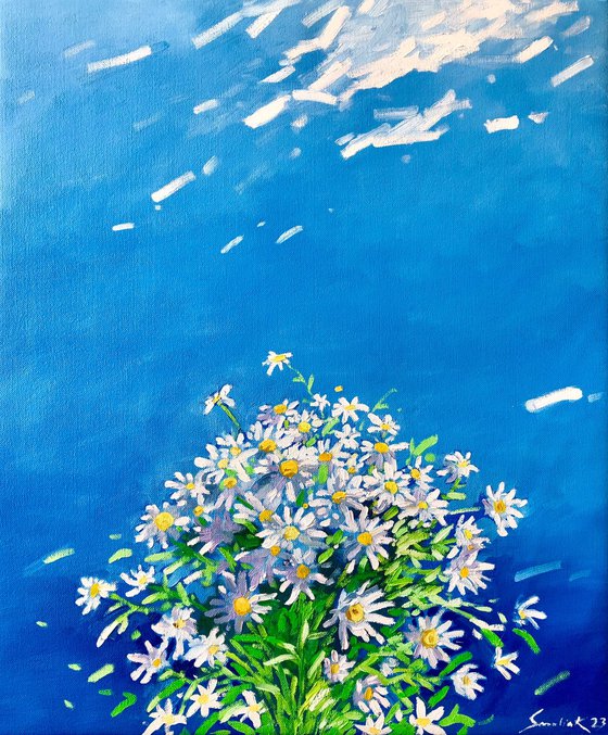 Blue sky with white flowers