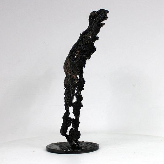 Pavarti Shadow and Light - male torso lace metal steel and bronze