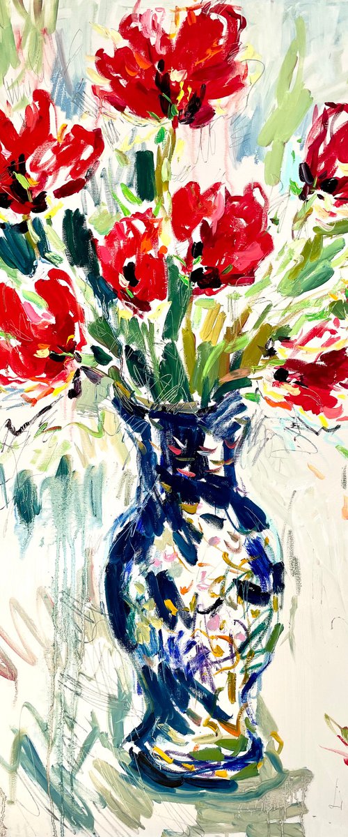 Red tulips in a blue vase. by Lilia Orlova-Holmes