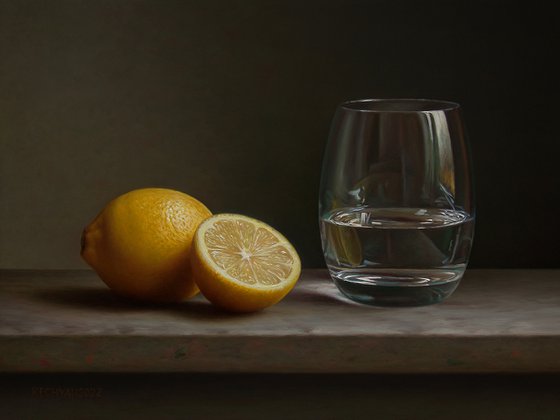 Lemons with a glass