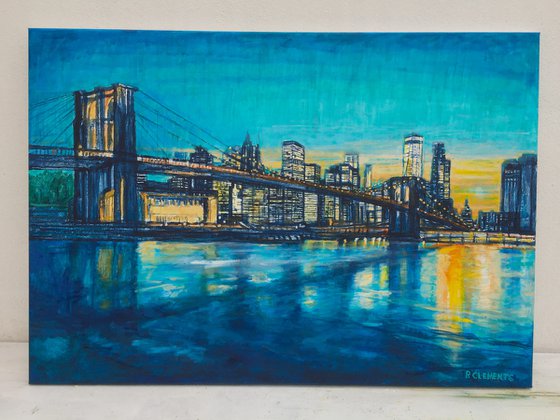 Brooklyn Bridge to Manhattan sunset with blue