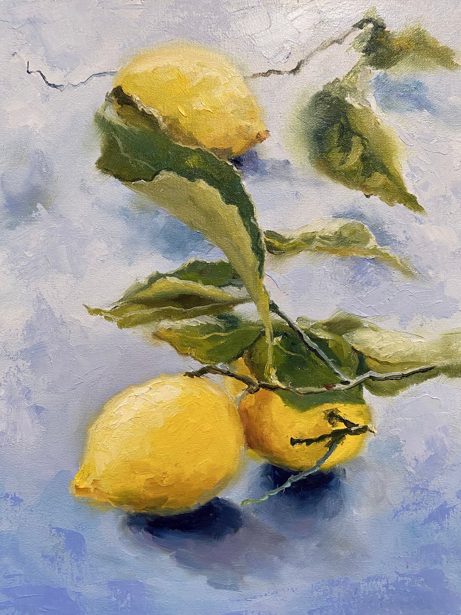 Lemons on a blue table by Elvira Sultanova